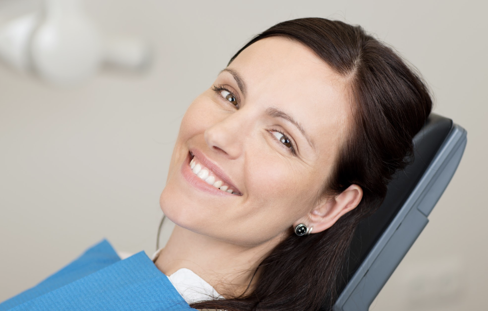 woman sitting in a dentist chair in narre warren