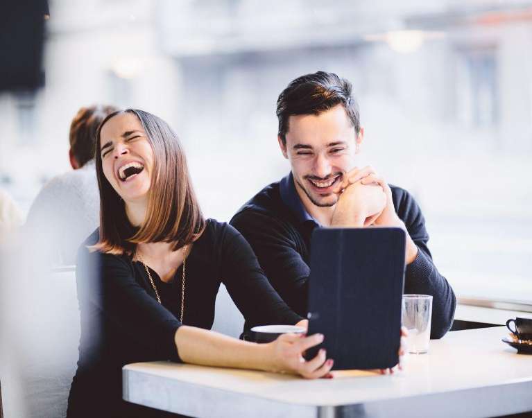 laughing couple with beautiful smiles having a fun time in narre warren