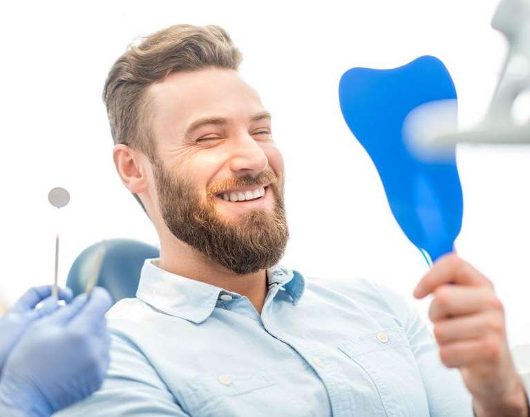 narre warren dental care | man after teeth clean